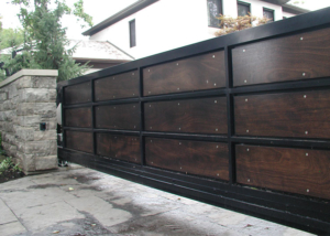 wood aluminum slide gate with masonry columns