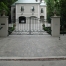 Rosedale swing gate with masonry columns