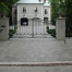 Rosedale swing gate with masonry columns